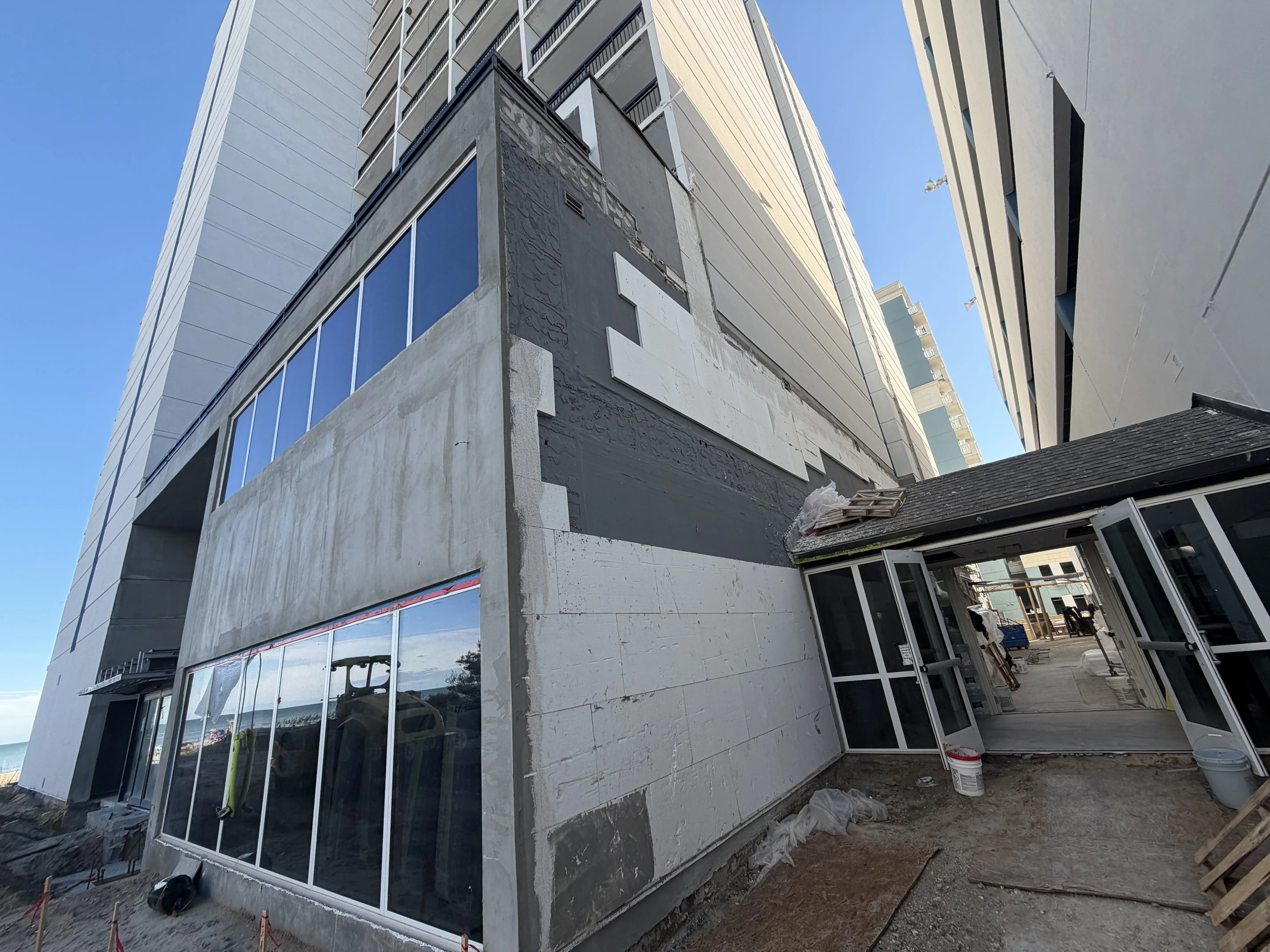 Commercial hotel exterior renovation at an entrance area