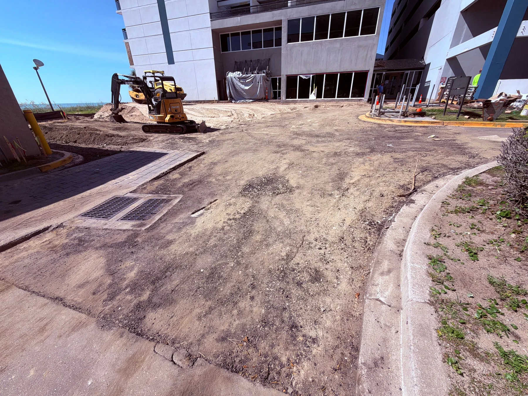 Multistory commercial property undergoing renovation and exterior site improvements