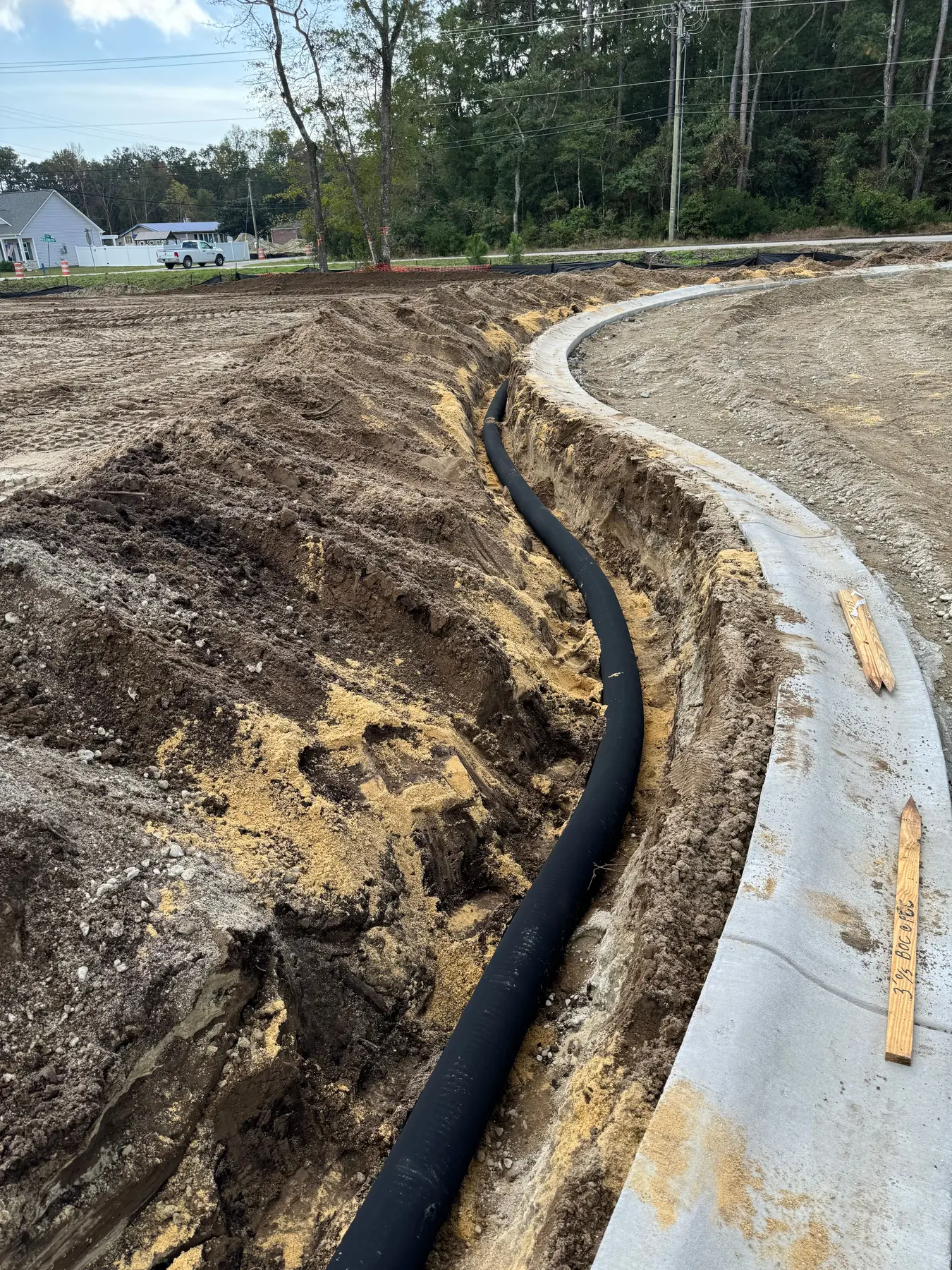 Curb and curb drain installation at a residential development