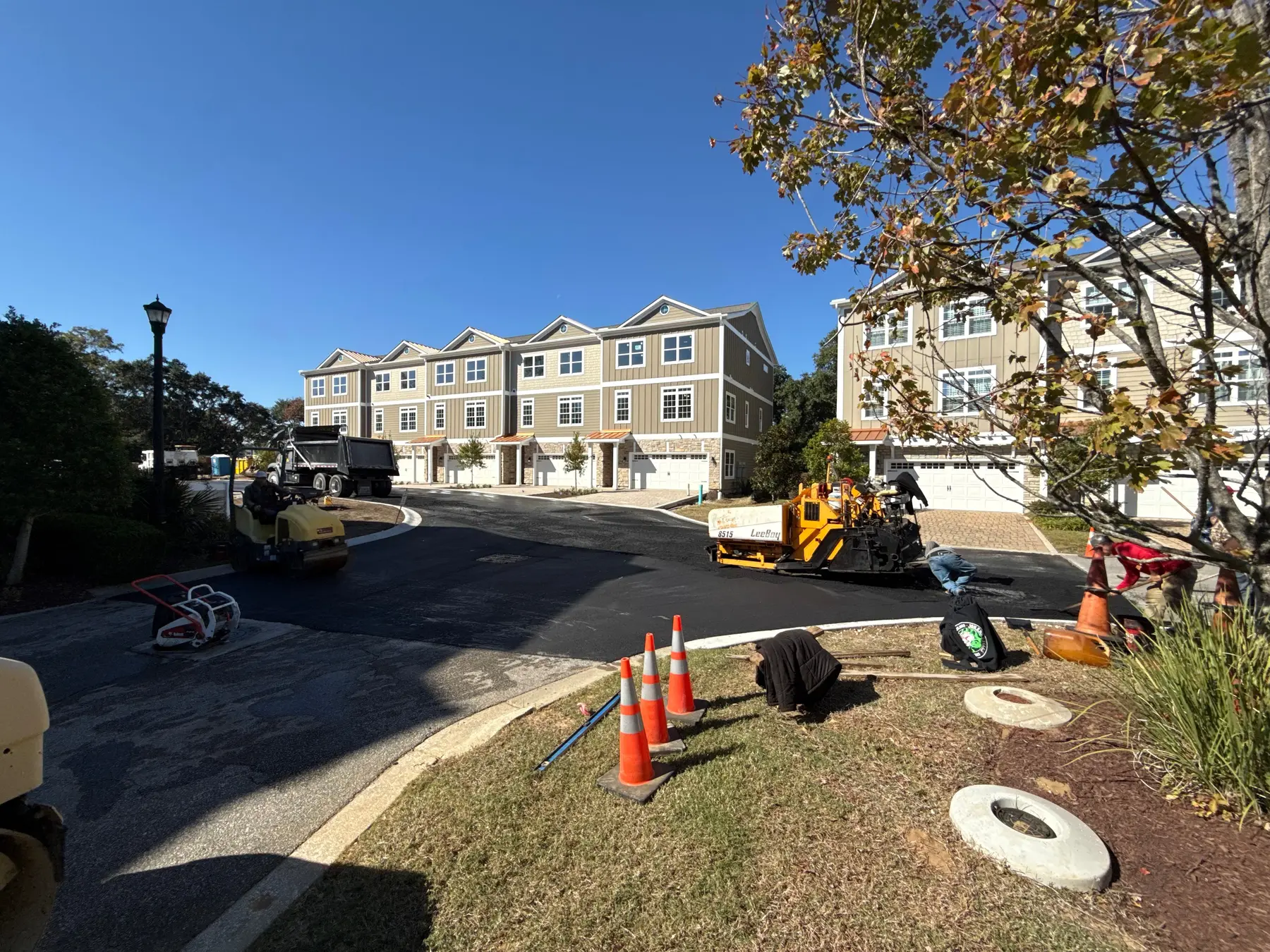 Paving and curb work in an expanded townhouse subdivision