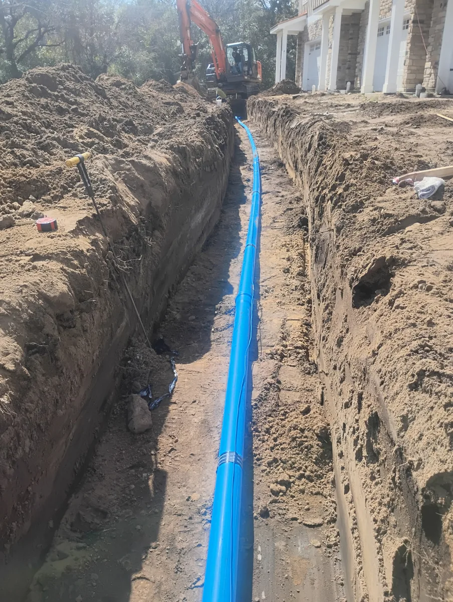 Blue water main installed through an active development site